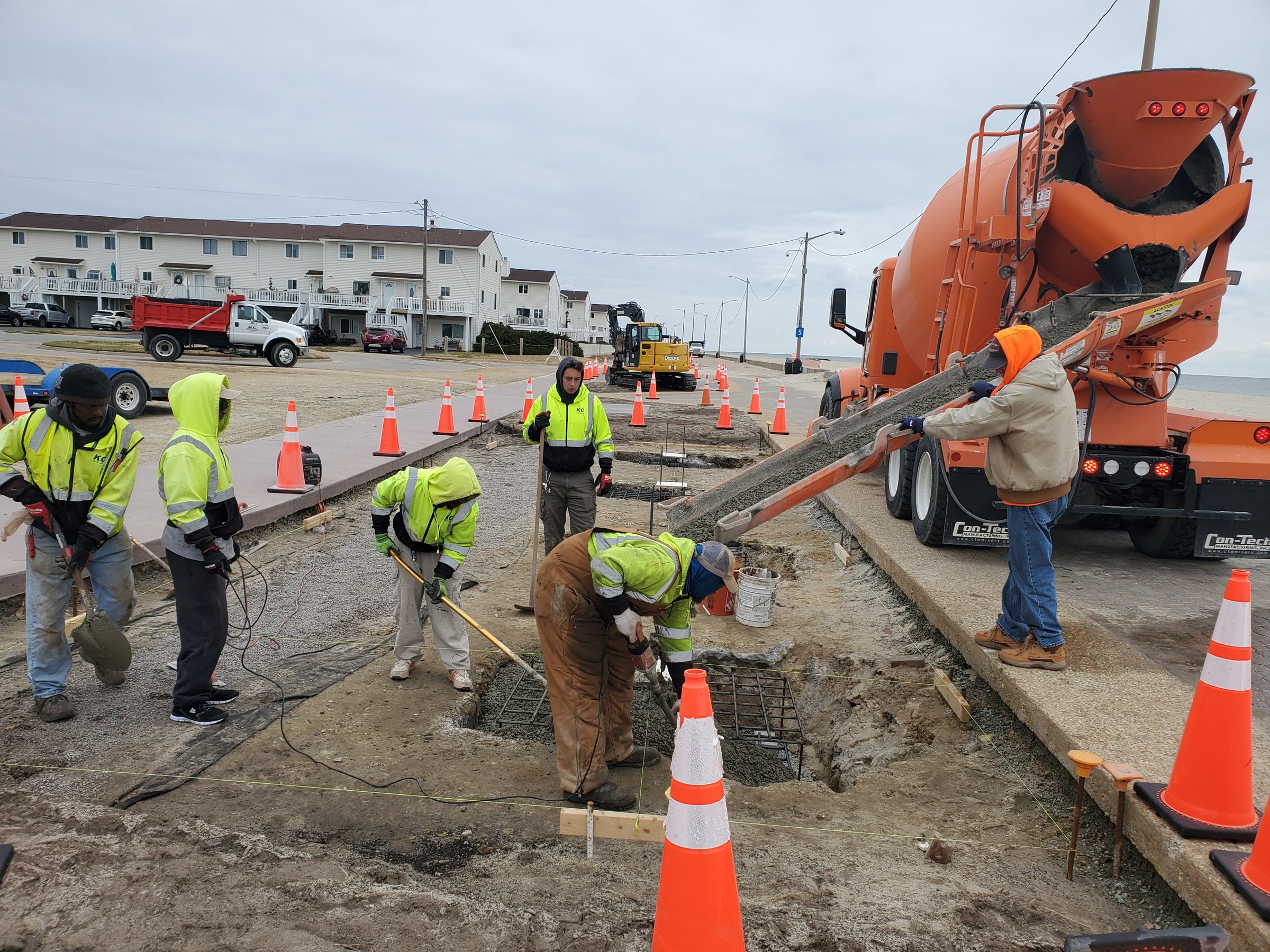 The crew places concrete foundations during the waterfront improvements.